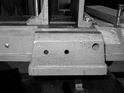 Band Saw Out Feed Table-10-two-holes-drilled-saw.jpeg