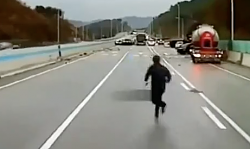 Black ice causes pileup - GIF-running-man.png