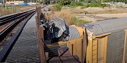 Car freighter train become convertible thru low-clearance bridge-low-clearance.jpg