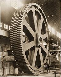 High-quality black-and-white photographs of large old machines and tools-huge-cog.jpg