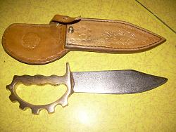 Leather skiving knife with sheath and knuckle knife with new sheath. 