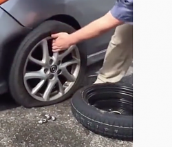 Man changes tire without a jack - GIF-screen-shot-2021-10-12-7.08.22-am.png