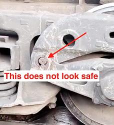 Rerailer ramp used on derailed train wheel - GIF-worn-pin-bushing.jpg