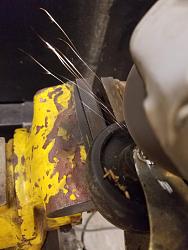 Salvaging Wheels from Rusted Out Casters-cutting_surfaceofrivet_withcutoffwheel.jpg