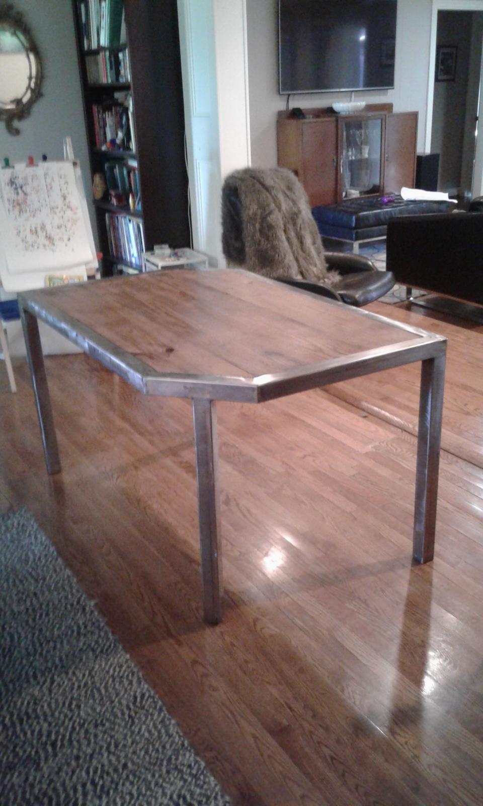 Steel table using 60 year old reclaimed wood