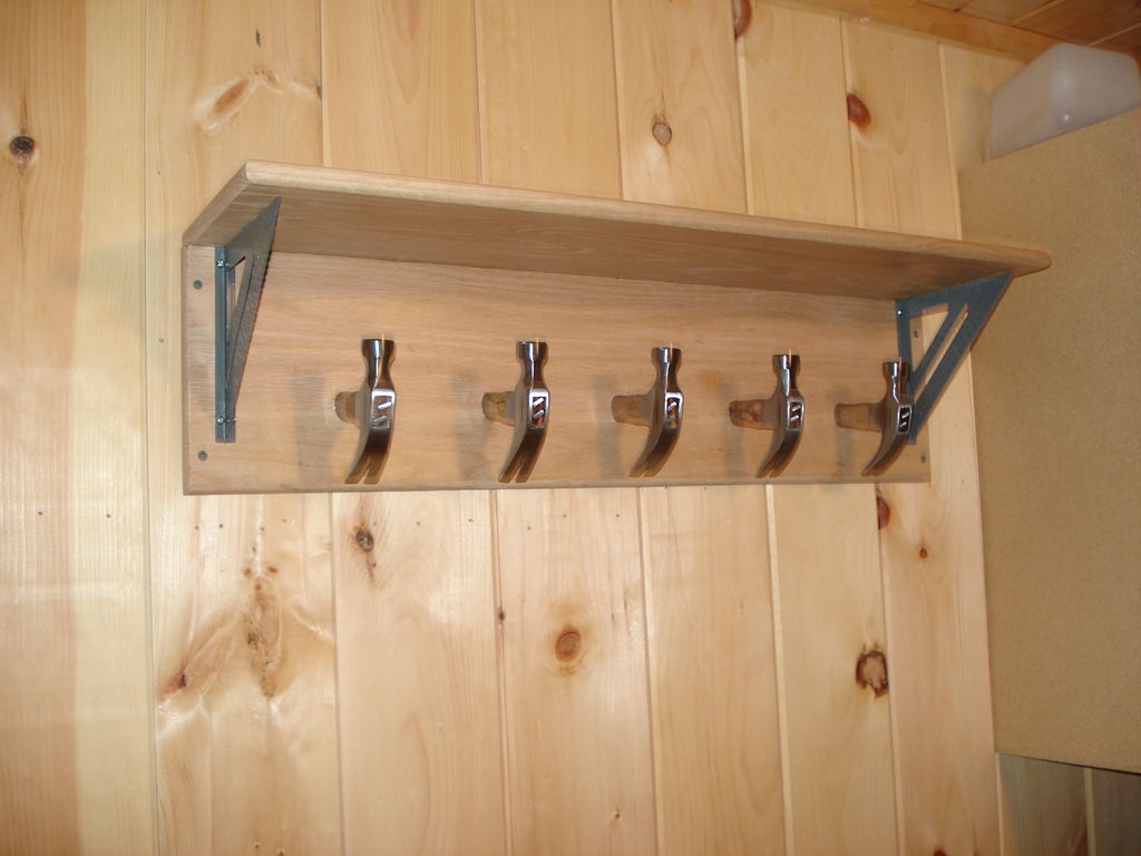 carpenter themed  coat rack

http://www.instructables.com/id/Carpenter-themed-fathers-day-coat-rack/